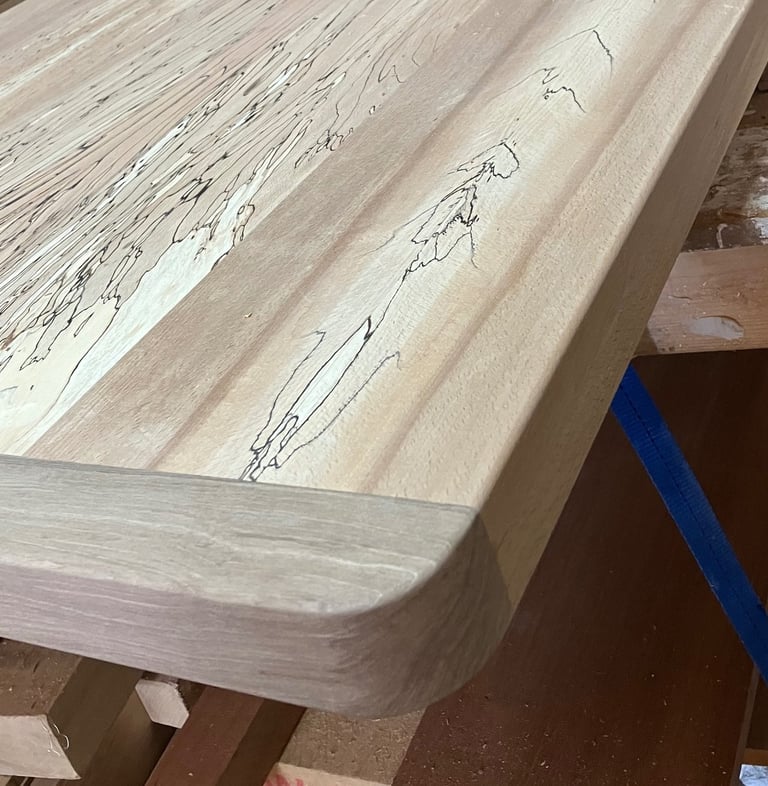Spalted beach and walnut breadboard end dining table book matched