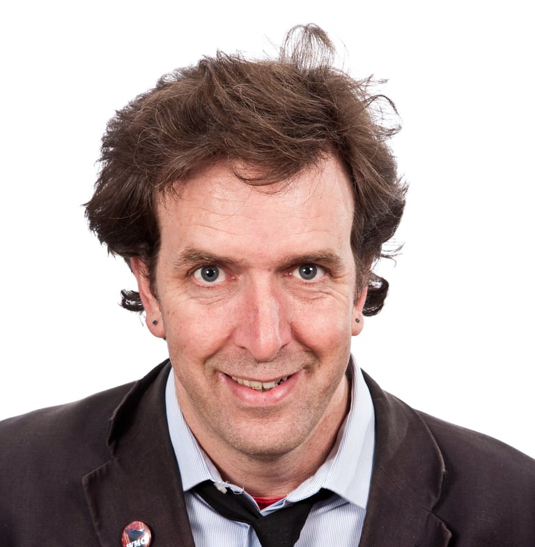 a man in a suit and tie with a tie