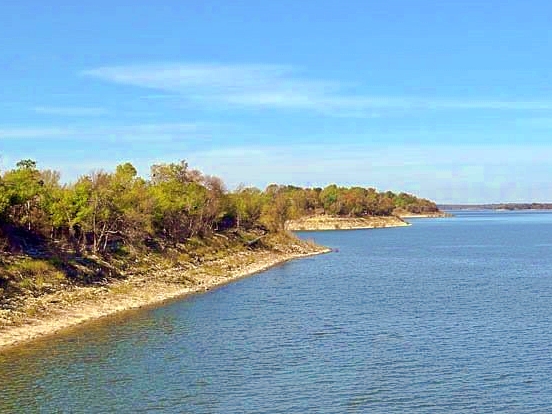 a boat is sailing on Lake Texoma