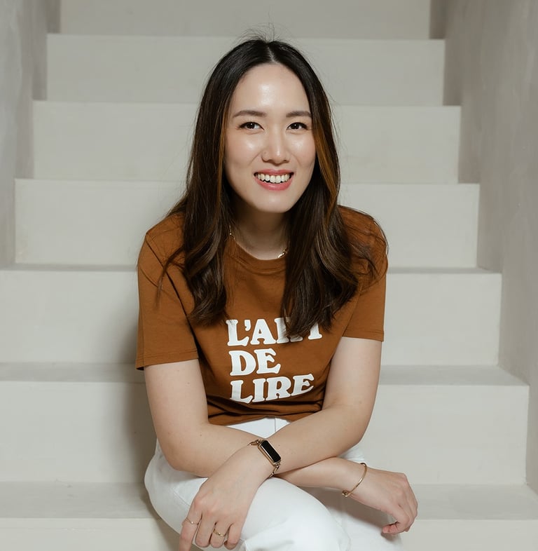 a woman sitting on a staircase case