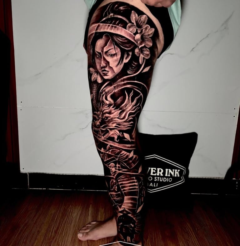 tattoo on tourist’s calf at Legian tattoo studio