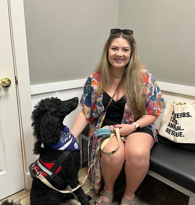 Therapy dog Raja and handler Holly.