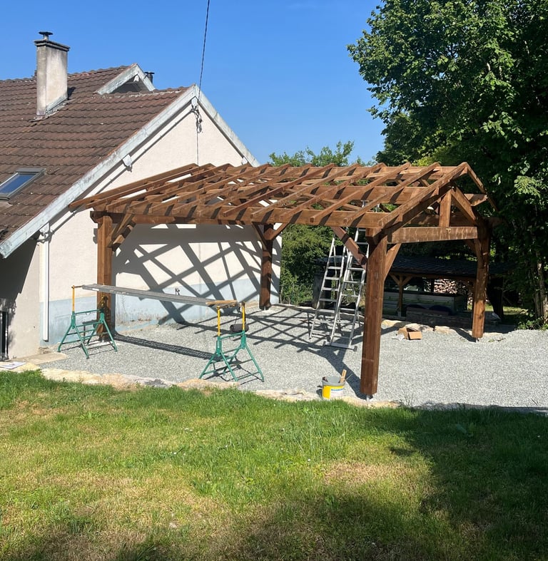 Abri de jardin à Hérimoncourt en bois traité autoclave marron.