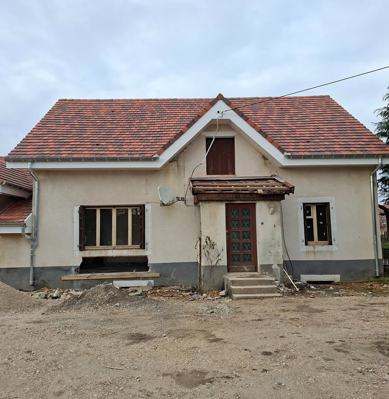 Rénovation toiture en tuiles vauban ecaille et isolation sarking en knaufthane sarking.