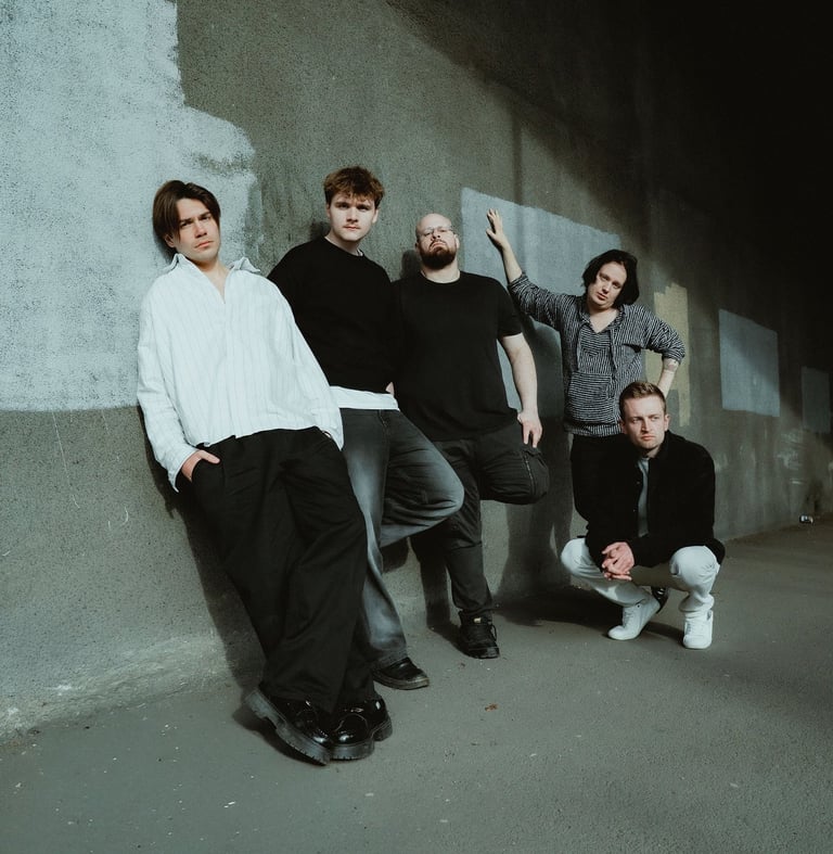 Lightlines band leaning along a wall