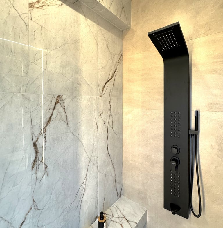 Ground Floor - Full bathroom with heated floors, waterfall shower and natural ventilation.
