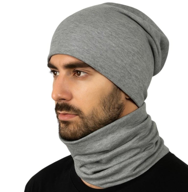 a man wearing a beanie hat and scarf