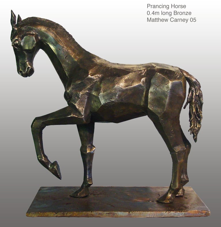 a bronze statue of a horse