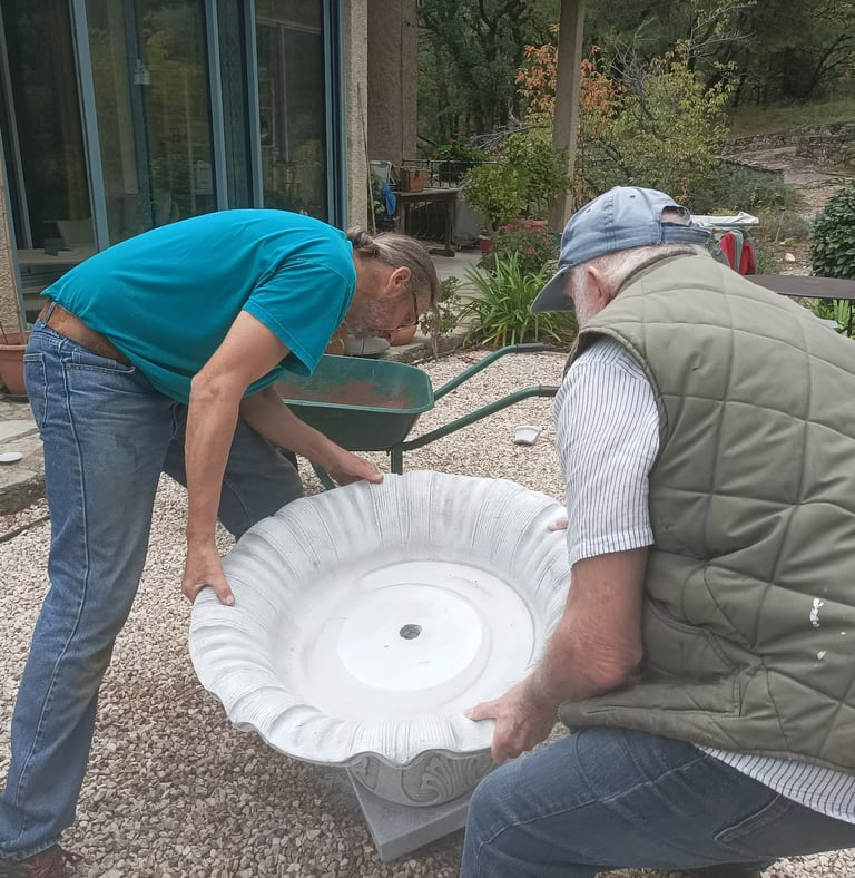 Setting the heavy fountain base in place