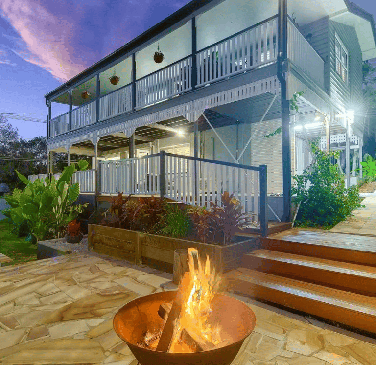 Finished Ashgrove Queenslander exterior repaint showing verandah and outdoor area