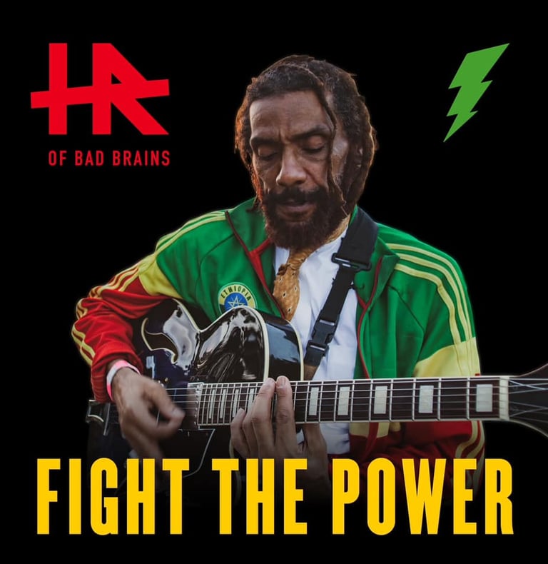 Dub Reggae band member HR of Bad Brains playing guitar at an event booked by J Phoenix Booking Agent