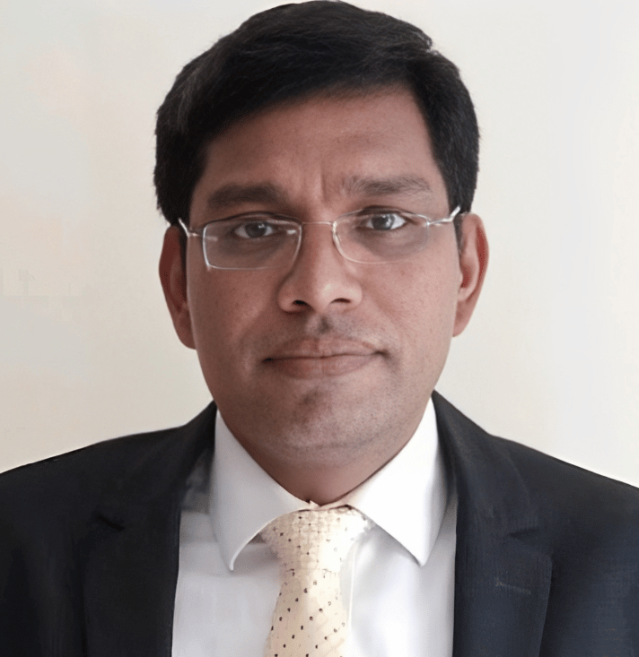 a man in a suit and tie with a tie