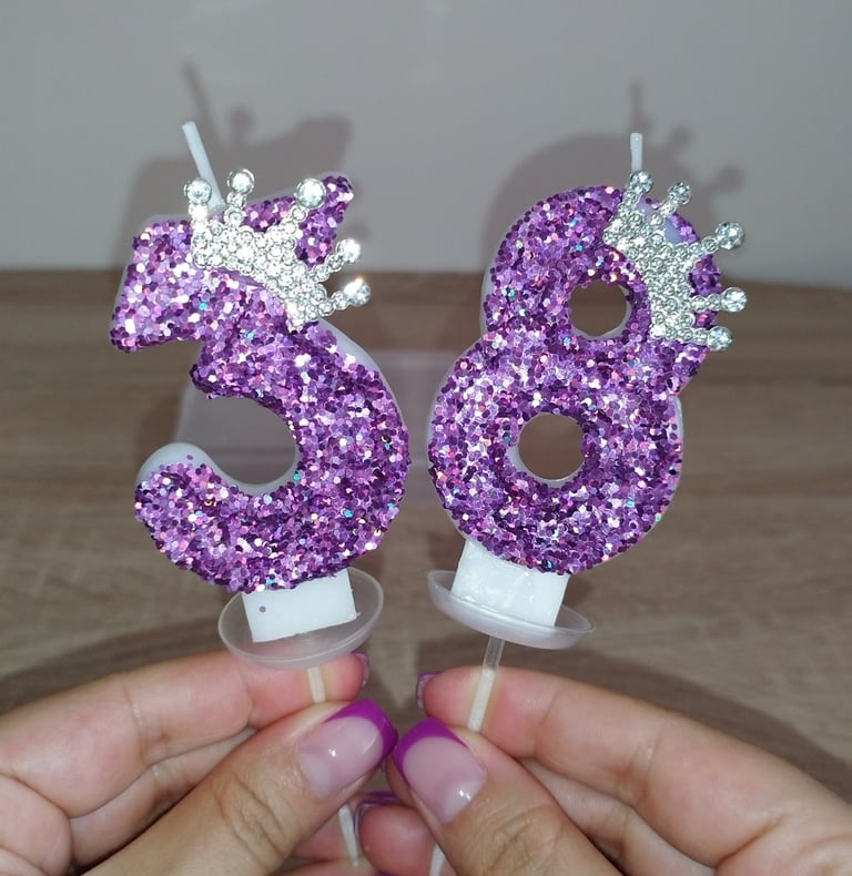Purple glitter number birthday candle with crown and sequins, safe wax cake topper for parties.