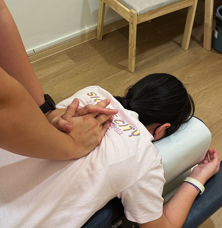 Chiropractic spinal adjustment therapy for back pain at Sinisana Chiropractic