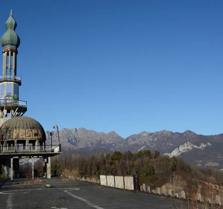 The abandoned Moorish-style minaret of Consonno rising above the ghost village in Lombardy