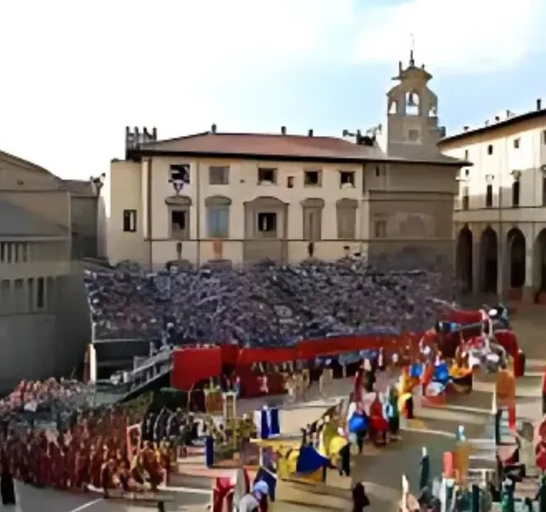 Crowd watching Giostra del Saracino medieval joust in Piazza Grande Arezzo