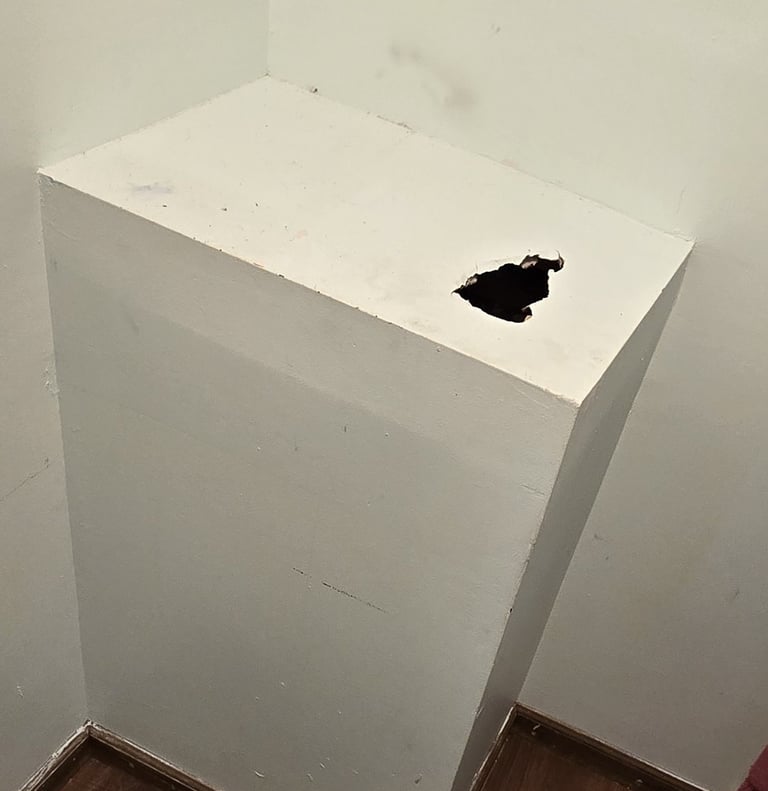 Broken air conditioning return in the closet.