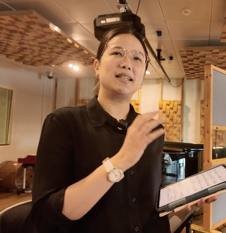 Flute artist explains technical details about the pieces of the project