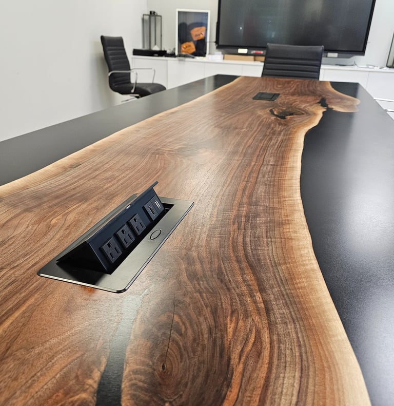 Black walnut epoxy river table with integrated power ports