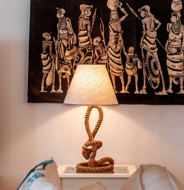 a lamp that is sitting on a table, zanzibar house