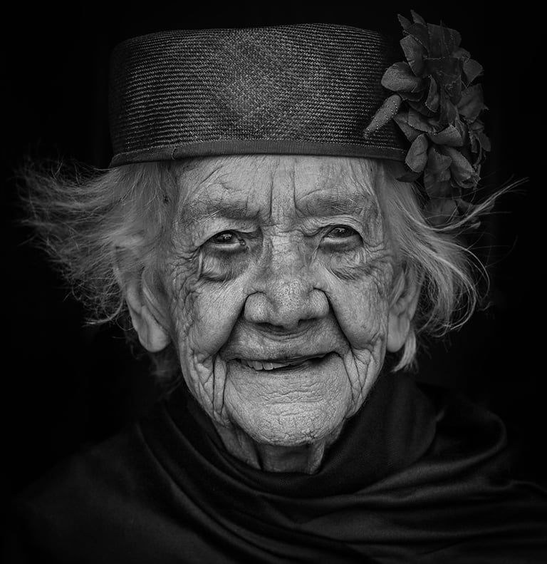 Street character portrait of woman by Carol Visser