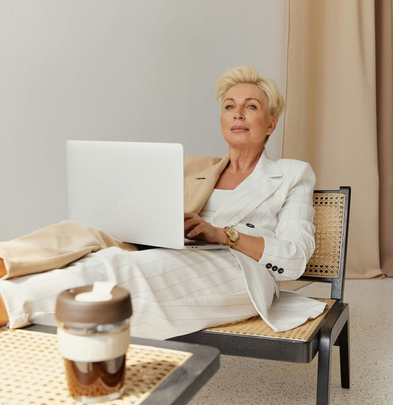 Professional reading iG101 weekly fitness newsletter with morning coffee