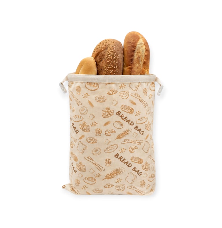 Reusable linen bread bag with a drawstring filled with fresh artisan loaves and baguette.