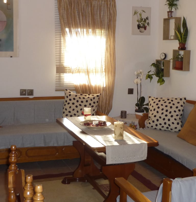 a living room with a couch and a table