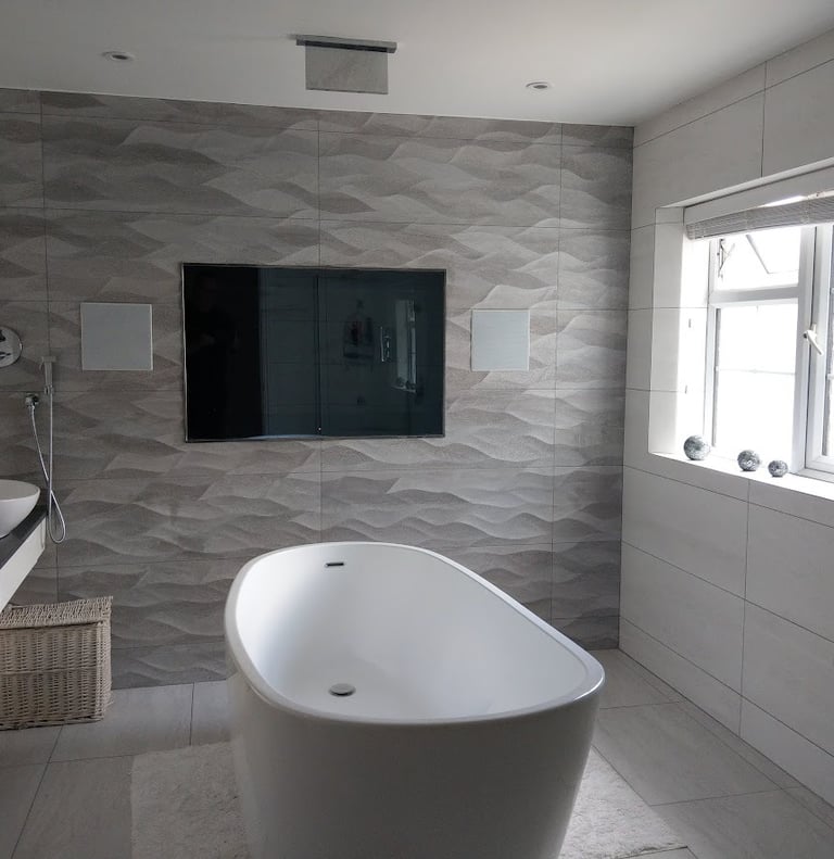 MountMyTV - Aquavision 65" TV, Bowers and Wilkins in-ceiling speakers in a bathroom