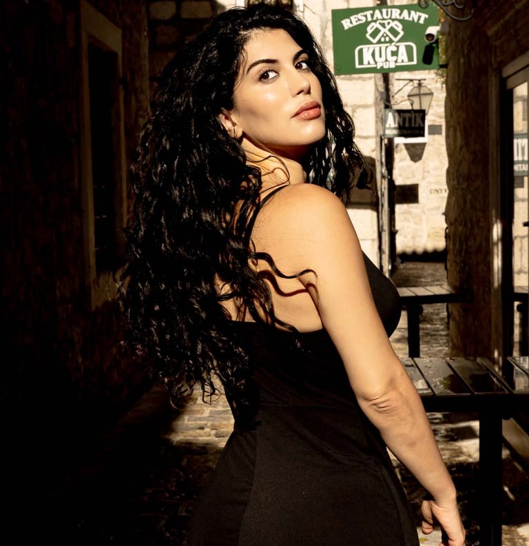 Girl with long hair in old town Budva - Photographer Budva