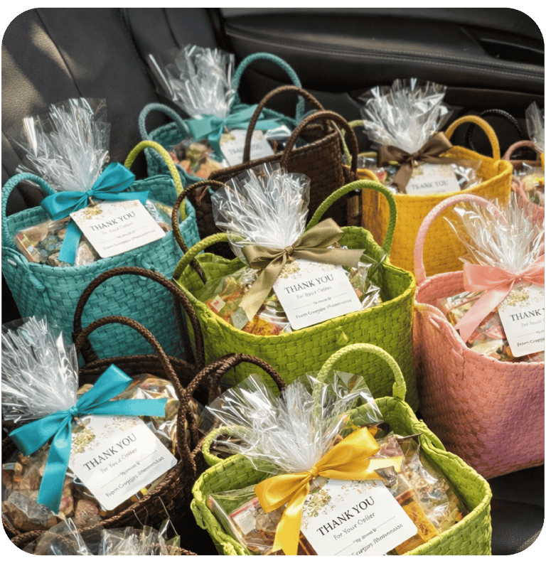 Bulk order of woven plastic souvenir bags prepared and packaged for shipment.