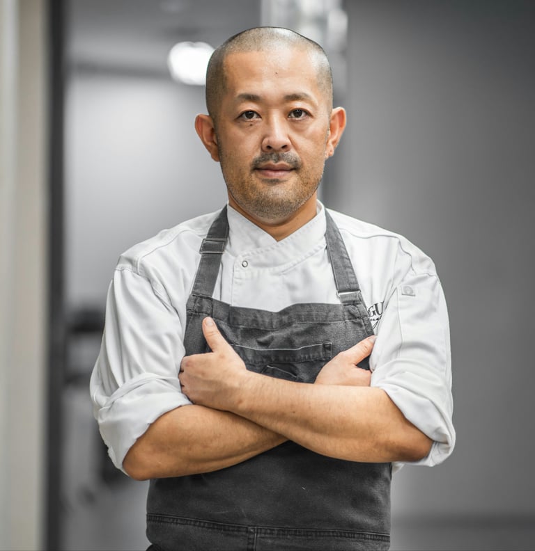 A restaurant chef is tired and frustrated after working a long shift and still has a lot of work.