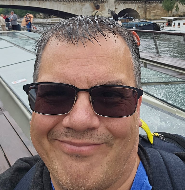 Here's Ben, our founder. He is wet on a Paris river tour...no, he did not fall in the Seine.