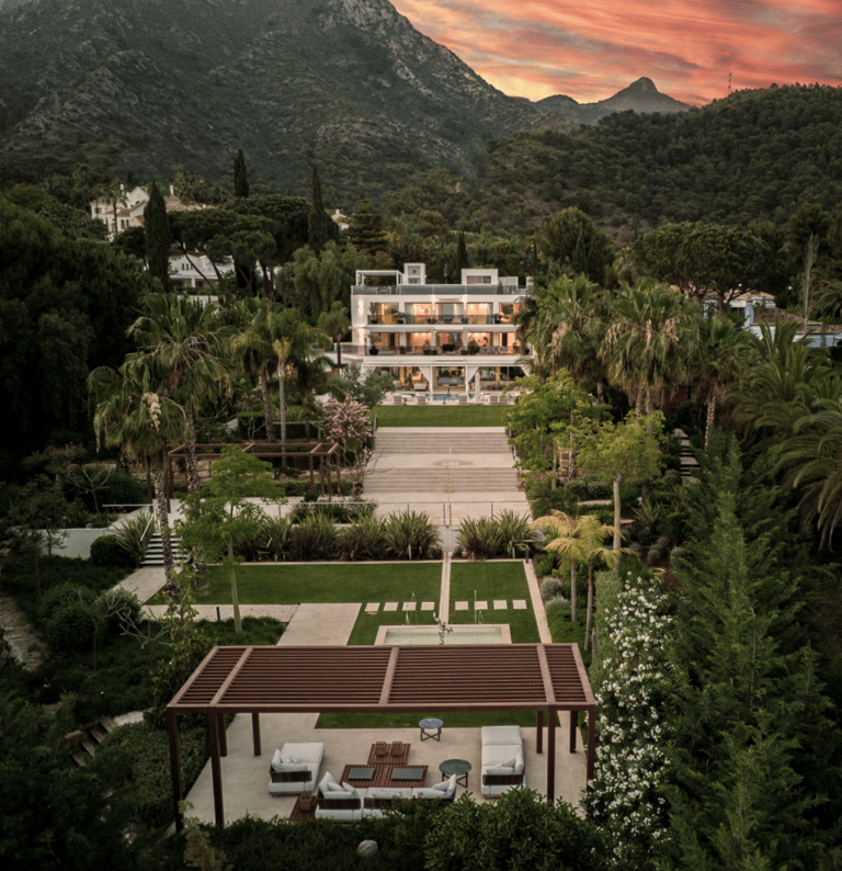 Panoramic dawn view of Villa Serenity with the Marbella hills in the background