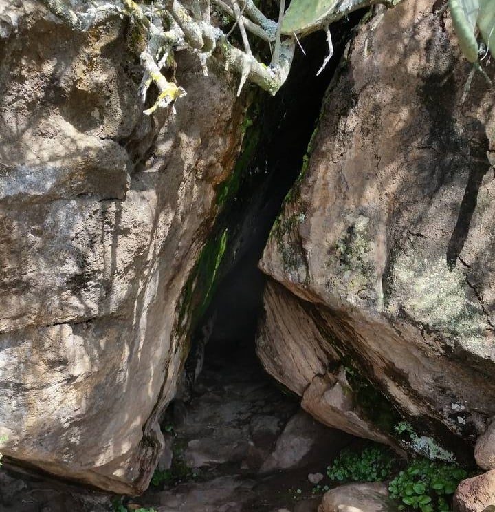 Benikulà cave in Pantelleria with natural steam rising from volcanic rocks