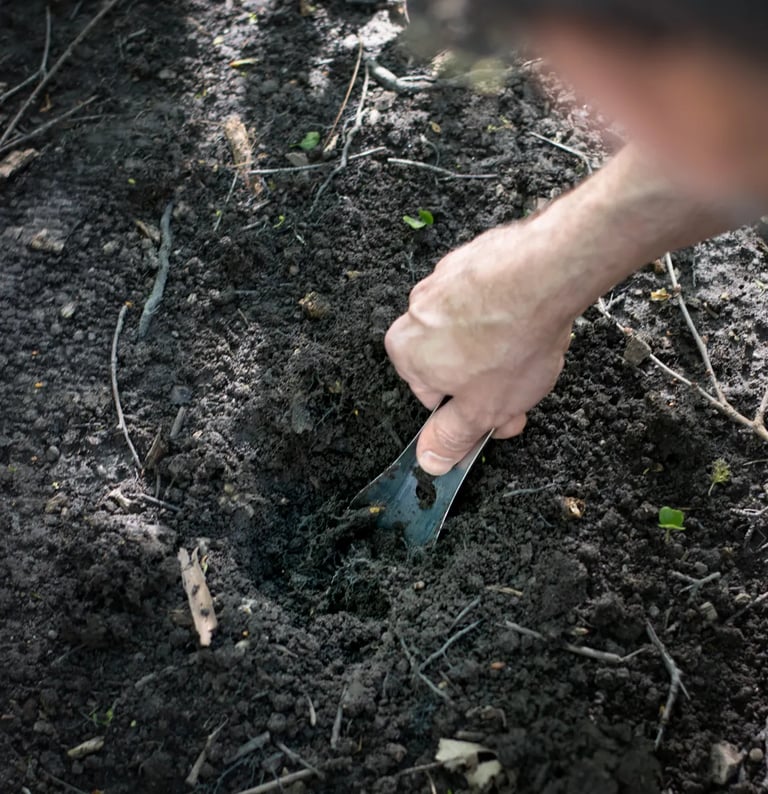 hand digging with boglerco trowel