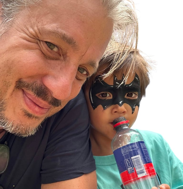 a man in a mask mask and a child in a mask mask