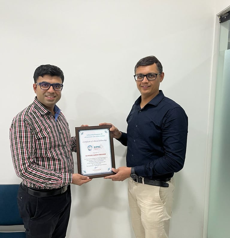 dr piyush vasaikar dhul presenting a certificate of clinical fellowship in a medical office setting.