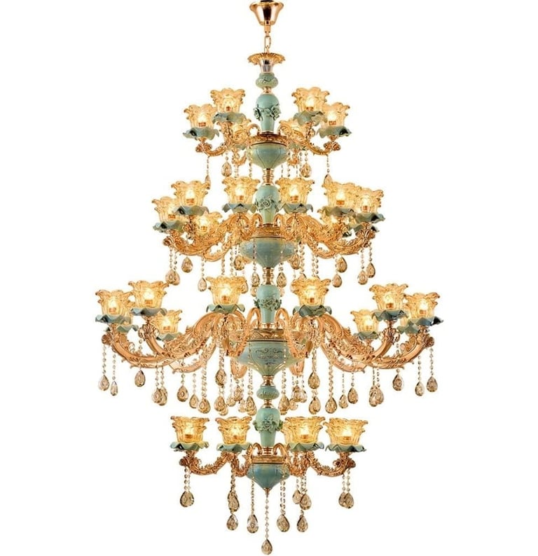 Elegant multi-tier luxury crystal chandelier with gold accents and teal ceramic details for high-end interior lighting.