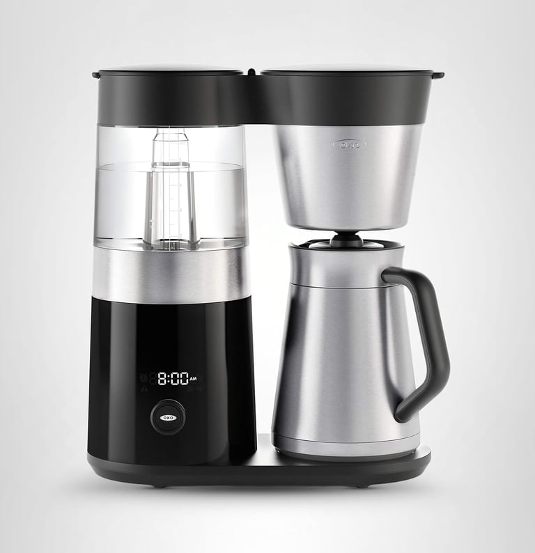 OXO Brew 9-cup coffee maker with stainless steel thermal carafe and digital display.