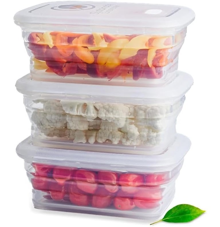 Stack of three collapsible platinum silicone food storage containers.