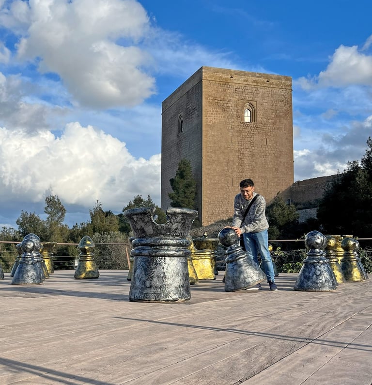 Giant chessboard inside Lorca Castle. In the background, the Alfonsí Tower, erected in the 13th cent