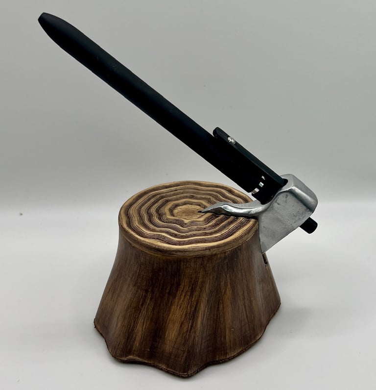An axe-shaped pen dock