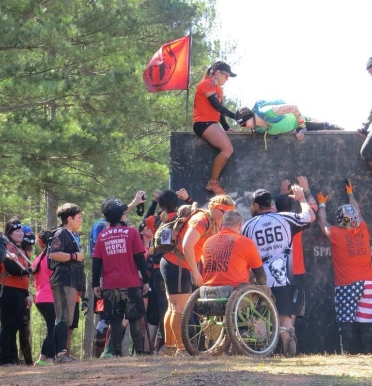 a woman in a wheelchair and a man in a wheelchair
