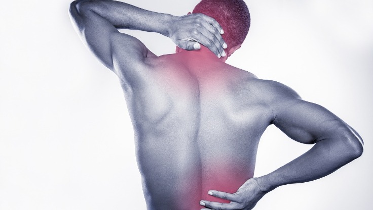 a man with a back pain Espace myo