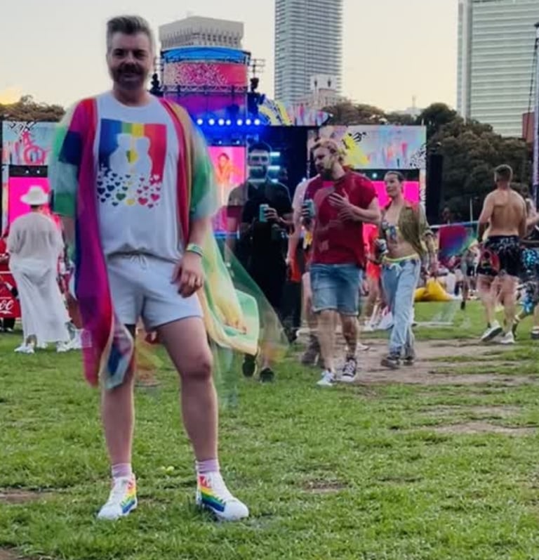 Gay kiss tee worn by LGBTQIA+ brand Flamingay founder