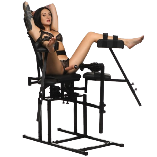 a woman in black lingerie on a sex chair that holds her legs apart and there is a dildo in front