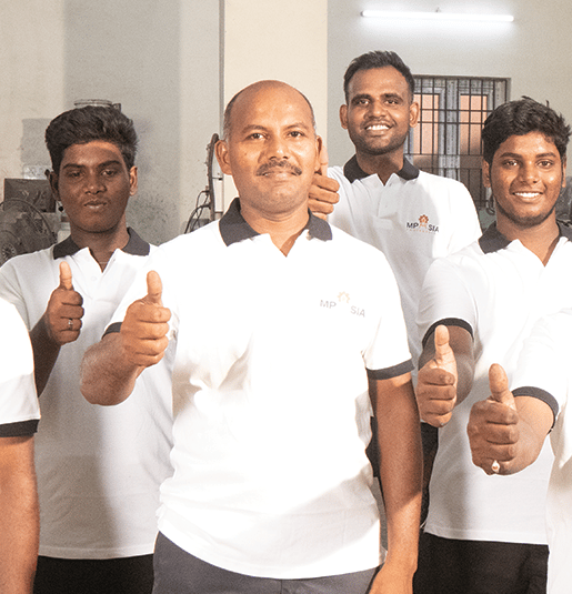 MP Asia Engineering Team With Thumbs Up posing on the plant