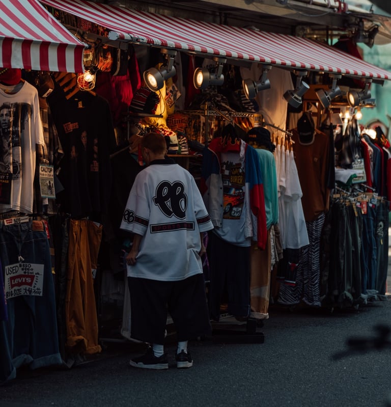 a man standing in front of a store