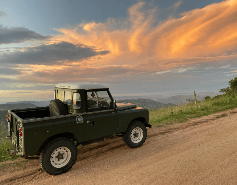 a land rover above the cliffs of Monteseel